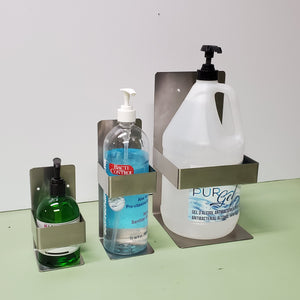 Supports pour distributeurs de savon et désinfectant